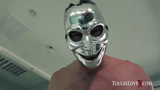 Shirtless masked stud in silver porn video
