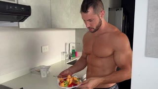 Shirtless muscular man in kitchen porn video